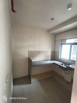 Kitchen in 2 BHK Apartment at Piramal Vaikunth, Balkum Pada – for Rent