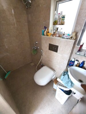 Bathroom in 1 BHK Apartment at JP Eminence, Andheri West – for Rent