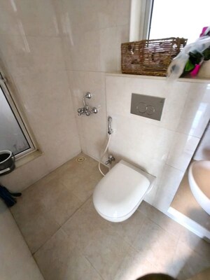 Bathroom in 1 BHK Apartment at JP Eminence, Andheri West – for Rent