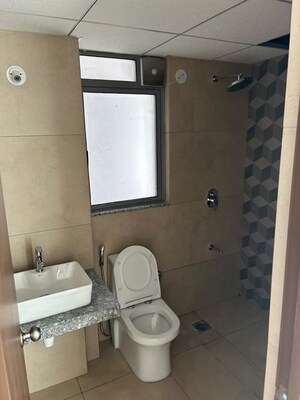 Bathroom in 3 BHK Apartment at Kalpataru Immensa, Kolshet Road – for Rent