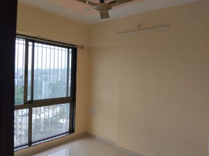 Room in 2 BHK Apartment at Chandak Nishchay, Borivali East – for Rent