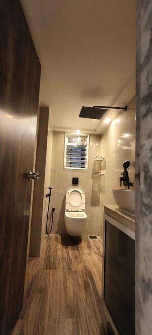 Bathroom in 2 BHK Apartment at Indra Darshan Apartment, Andheri West – for Rent