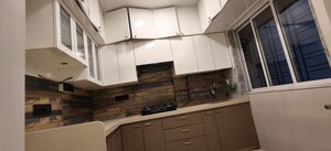 Kitchen in 2 BHK Apartment at Indradarshan II, Oshiwara – for Rent