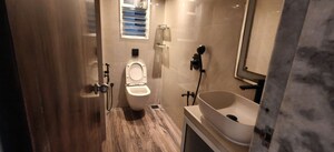 Bathroom in 2 BHK Apartment at Indradarshan II, Oshiwara – for Rent