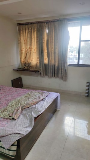 Bedroom in 2 BHK Apartment at Mumbai Central Suburbs – for Rent