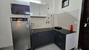 Kitchen in 1 RK Builder Floor at Ansal API Esencia, Sector 67 – for Rent