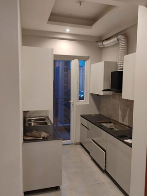 Kitchen in 3 BHK Apartment at Apex The Kremlin, Siddharth Vihar – for Rent