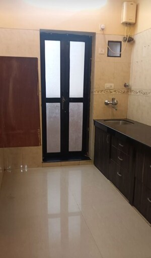 Kitchen in 1 BHK Apartment at K Raheja Heights, Malad East – for Sale