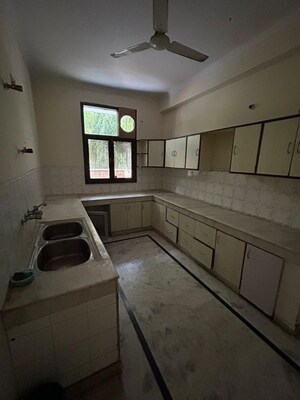 Kitchen in 4 BHK Builder Floor at DLF Royale Residences, Dlf Phase I – for Rent