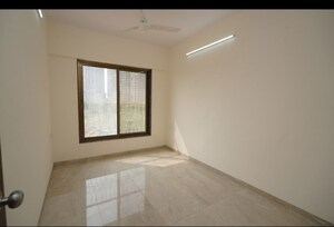 Room in 2 BHK Apartment at Abrol Signature, Malad West – for Sale