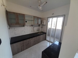 Kitchen in 2 BHK Apartment at LMS Finswell Woods, Viman Nagar – for Rent