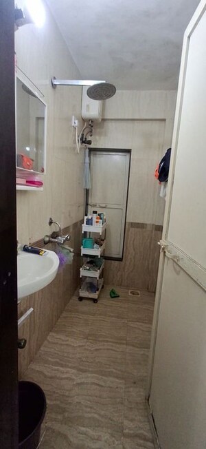 Bathroom in 1 BHK Apartment at Yamuna Villa, Andheri West – for Rent