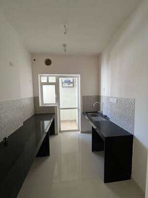 Kitchen in 2 BHK Apartment at Godrej Nurture Pune, Mamurdi – for Sale