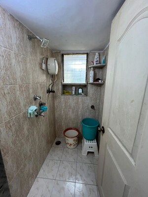 Bathroom in 2 BHK Apartment at Naman Habitat, Andheri West – for Rent