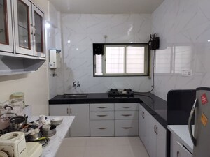 Kitchen in 2.5 BHK Apartment at Yash Sankul, Pimple Saudagar – for Rent