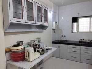 Kitchen in 2.5 BHK Apartment at Yash Sankul, Pimple Saudagar – for Rent