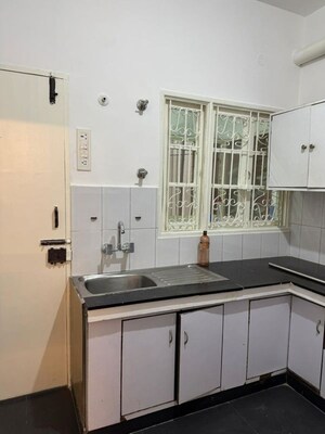Kitchen in 3 BHK Apartment at Lalazar Apartment, Palace Road – for Sale