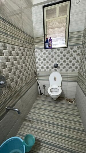 Bathroom in 3 BHK Apartment at Arun Sheth Sanskriti Phase III, Wakad – for Rent