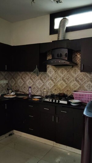 Kitchen in 2 BHK Apartment at Arun Vihar Sector 37, Sector 37 – for Rent