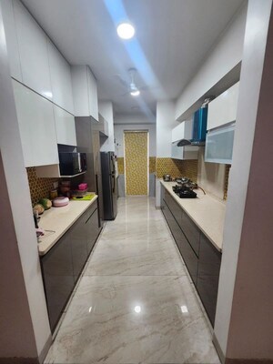 Kitchen in 4 BHK Builder Floor at Ansal API Esencia, Sector 67 – for Sale