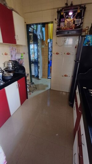 Kitchen in 2 BHK Apartment at Bhushan Park View CHS, Borivali West – for Rent