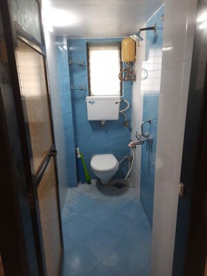 Bathroom in 2 BHK Apartment at Bhushan Park View CHS, Borivali West – for Rent