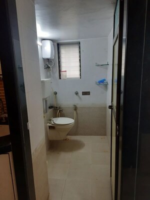 Bathroom in 2 BHK Apartment at Bhushan Park View CHS, Borivali West – for Rent