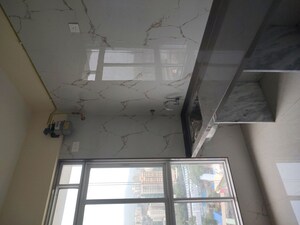 Kitchen in 1 BHK Apartment at Kosmos Express Tower CHS, Borivali West – for Rent