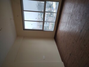 Room in 1 BHK Apartment at Kosmos Express Tower CHS, Borivali West – for Rent