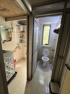 Bathroom in 1 BHK Apartment at Kaustubh Usha Colony CHS, Malad West – for Rent