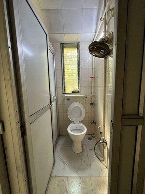 Bathroom in 1 BHK Apartment at Kaustubh Usha Colony CHS, Malad West – for Rent