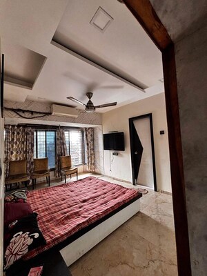 Bedroom in 2 BHK Apartment at Maharaja Retreat CHS, Goregaon East – for Rent
