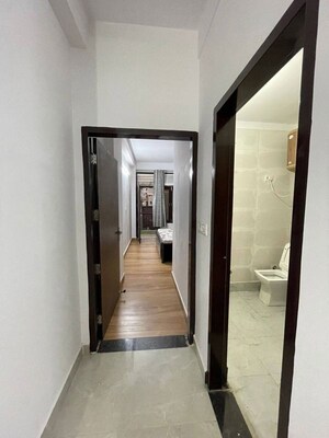 Building Lobby in 1 BHK Apartment at Sainik Farm – for Rent