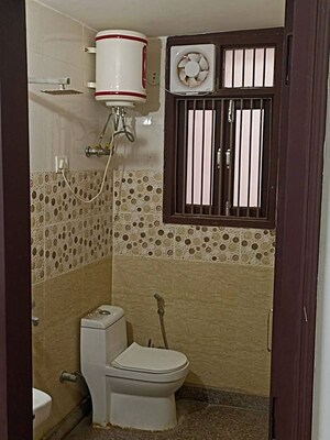 Bathroom in 1 BHK Apartment at Sainik Farm – for Rent