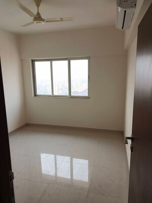 Room in 2 BHK Apartment at Omkar Signet, Malad East – for Rent