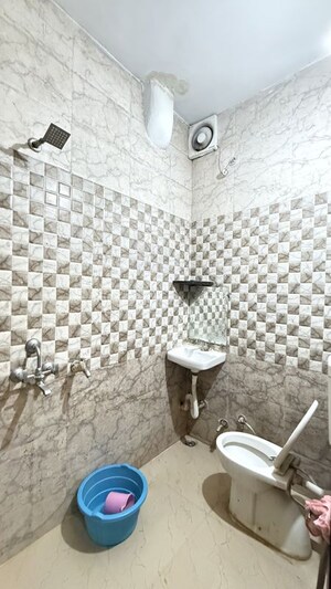 Bathroom in 2.5 BHK Builder Floor at Vinay Nagar – for Rent