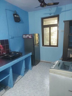 Kitchen in 1 BHK Apartment at Kiran Chandra CHS, Andheri West – for Rent