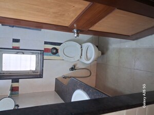 Bathroom in 1 BHK Apartment at Kiran Chandra CHS, Andheri West – for Rent