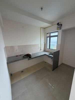 Kitchen in 1 BHK Apartment at Piramal  Vaikunth Cluster 4, Balkum Pada – for Rent