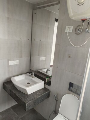 Bathroom in 3.5 BHK Apartment at Microtek Greenburg, Sector 86 – for Rent