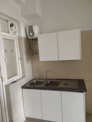 Kitchen in 3.5 BHK Apartment at Microtek Greenburg, Sector 86 – for Rent