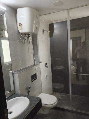 Bathroom in 3.5 BHK Apartment at Microtek Greenburg, Sector 86 – for Rent