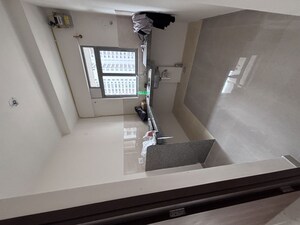 Kitchen in 2 BHK Apartment at Dosti West County, Balkum Pada – for Rent
