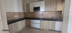 Kitchen in 3 BHK Apartment at Mahagun Mywoods, Sector 16c Greater Noida – for Rent