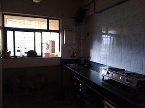 Kitchen in 2 BHK Apartment at Happy Valley, Manpada – for Rent