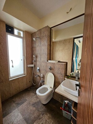 Bathroom in 3 BHK Apartment at Omkar Alta Monte, Malad East – for Rent