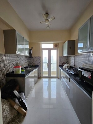 Kitchen in 3 BHK Apartment at Omkar Alta Monte, Malad East – for Rent