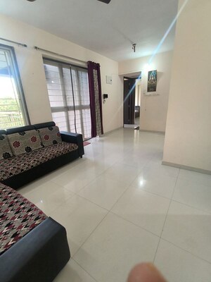 Living Room in 1.5 BHK Apartment at Legacy Aqua Marina, Ravet – for Rent