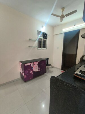 Living Room in 1.5 BHK Apartment at Legacy Aqua Marina, Ravet – for Rent