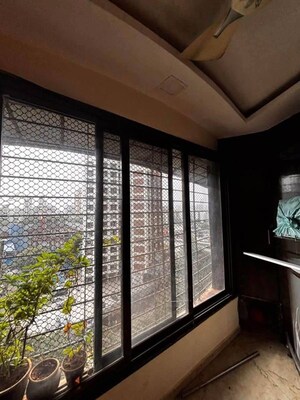 Kitchen in 2 BHK Apartment at Maharaja Retreat CHS, Goregaon East – for Rent